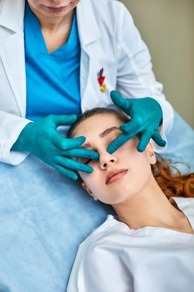 Doctor examining nose for rhinoplasty consultation at MicroCare ENT Hospitals Hyderabad Telangana